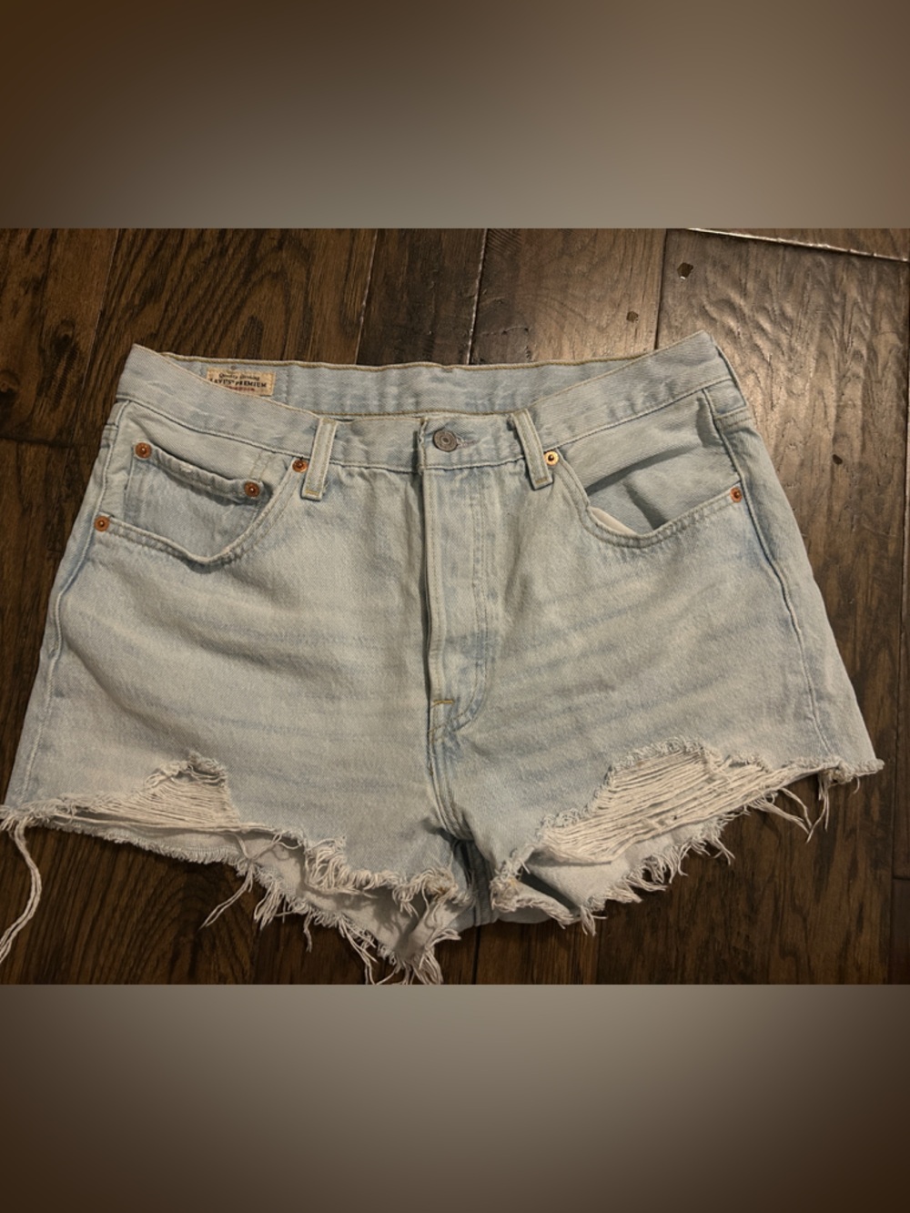 Levi’s 501 Light Blue Distressed Denim Shorts